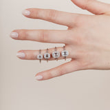 The Emerald Solitaire with Halo