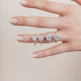 The Round Solitaire with Pavé band and Halo