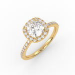 A cushion solitaire diamond ring with Pavé band and Halo design that highlight the beauty of the center stone.