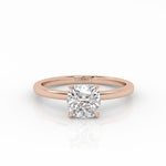 Lab-grown diamond engagement ring with a 1 carat cushion cut diamond in the rose gold band.