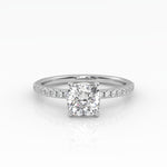 Elegant Cushion Solitaire Engagement Ring with sparkling pavé band shown in white gold.