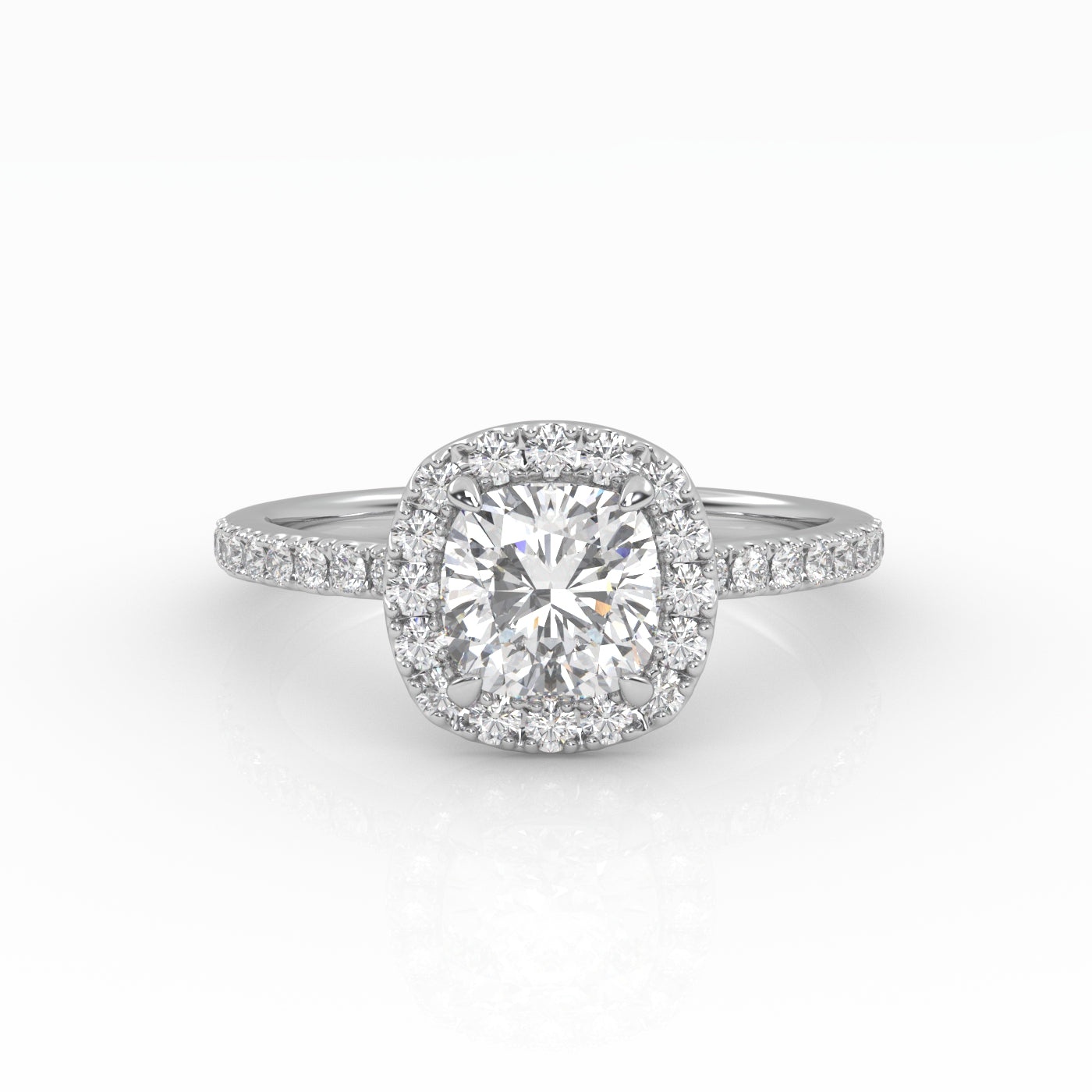A dazzling cushion-cut diamond nestled on a stunning white gold Halo and Pavé band setting.