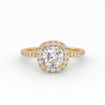 A captivating cushion-shaped diamond engagement ring with a luxurious Halo and Pavé band design.