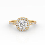 A captivating cushion-shaped diamond engagement ring with a luxurious Halo and Pavé band design.