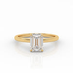 Emerald Solitaire engagement ring, made of 1-carat lab-grown diamond and 18k yellow gold.