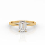 Emerald Solitaire engagement ring, made of 1-carat lab-grown diamond and 18k yellow gold.