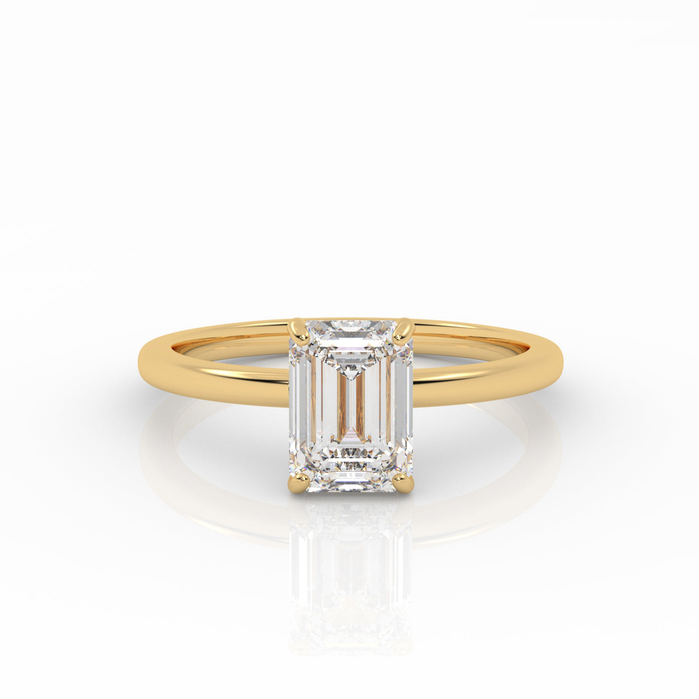 Emerald Solitaire engagement ring, made of 1-carat lab-grown diamond and 18k yellow gold.