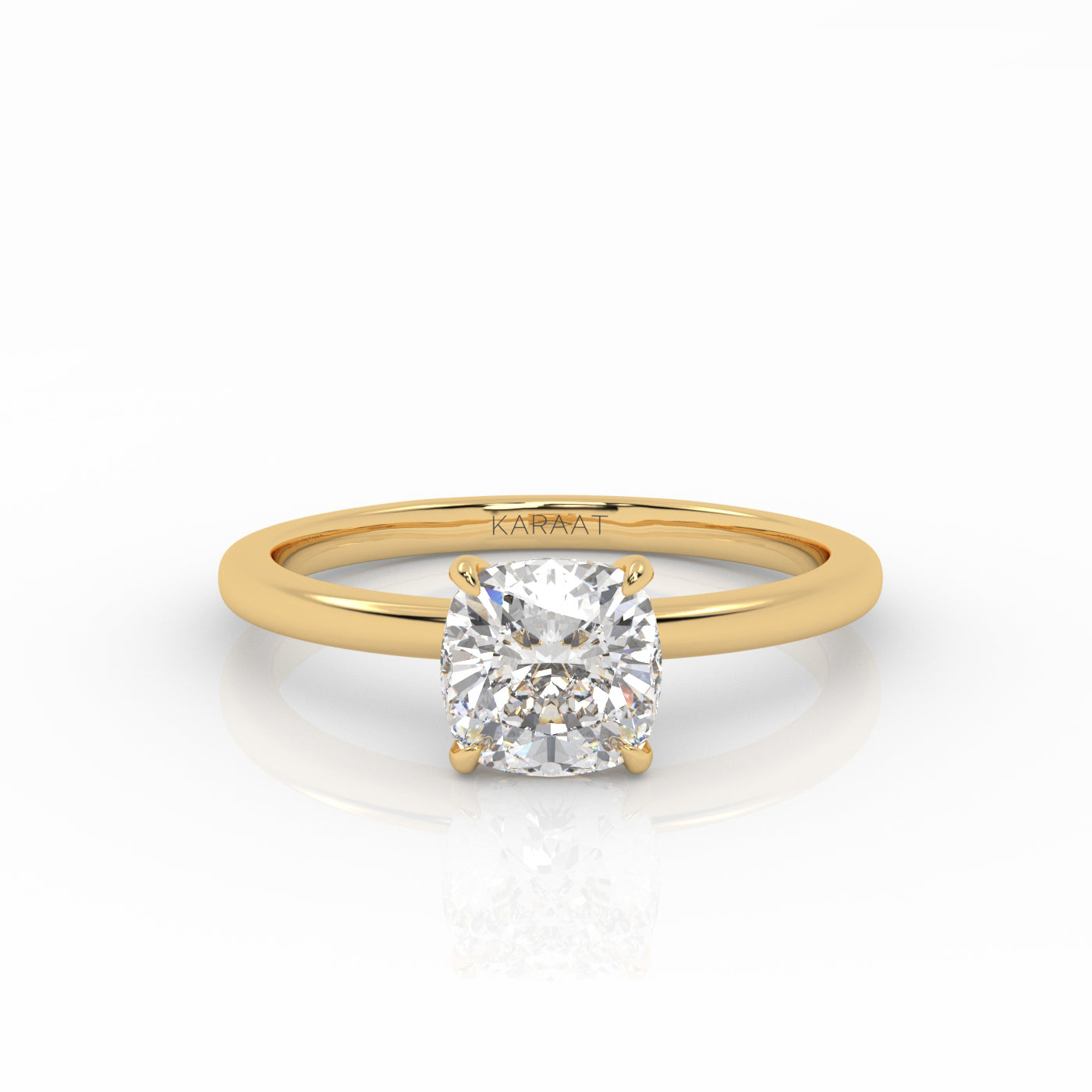 Cushion Solitaire engagement ring, made of 1 carat lab-grown diamond and 18k yellow gold.