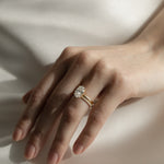 Close-up photo of a KARAAT lab-grown Oval Solitaire diamond ring in 18k rose gold, showcasing the high-clarity stone facets and the precision of the solitaire setting