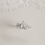 Round and Pear Toi et Moi lab-grown diamond ring in white gold on cream silk