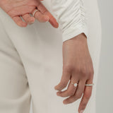 Model wearing the KARAAT Round Solitaire in 18k rose gold, highlighting the brilliance of the lab-grown diamond on hand.