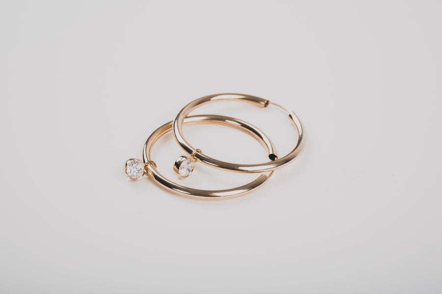 Modern Diamond Drop Hoops, made of ethical lab-grown diamonds and recycled solid gold for everyday wear. 