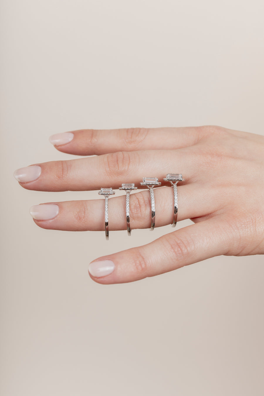 The Emerald Solitaire with Pavé band and Halo