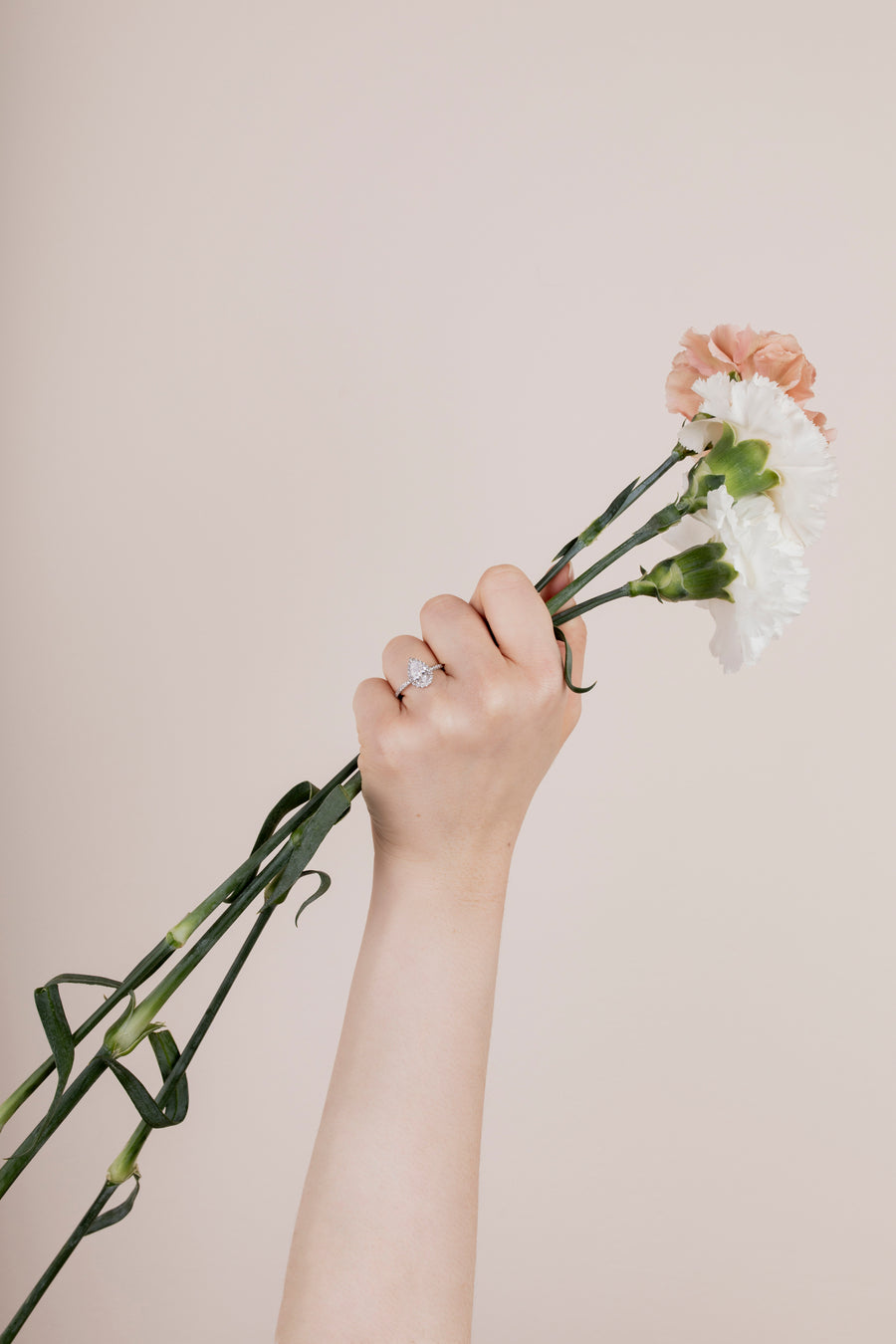 The Pear Solitaire with Pavé band and Halo