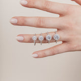 The Round Solitaire with Pavé band and Halo