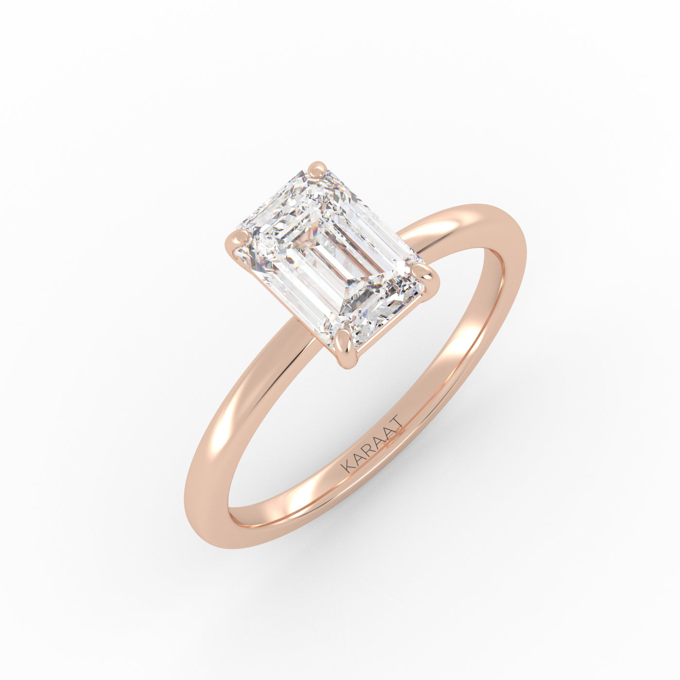 Emerald Solitaire lab-grown diamond ring in a rose gold 4-prong setting. 