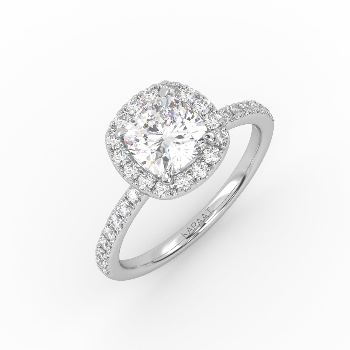 Elegant cushion-cut diamond solitaire engagement ring in white gold with a diamond Pavé band and Halo design.   