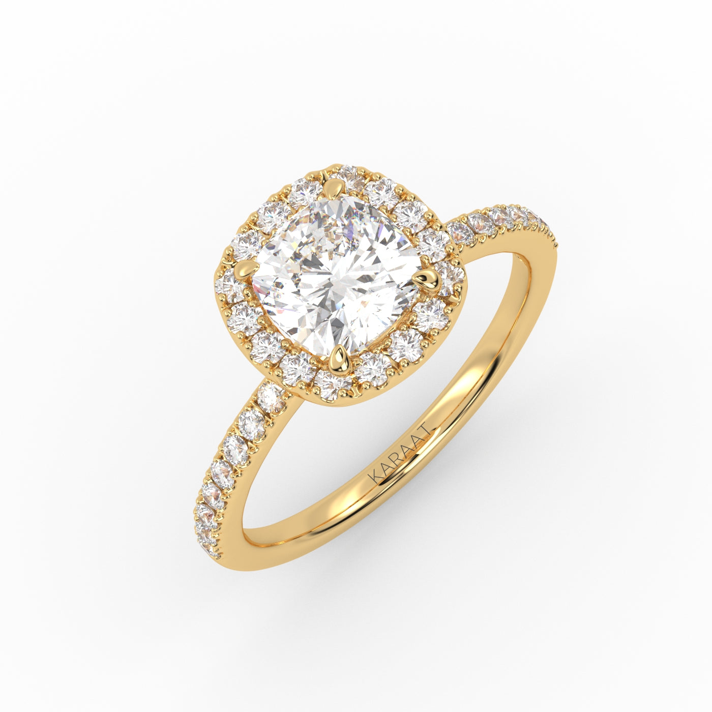 A cushion solitaire diamond ring with Pavé band and Halo design that highlight the beauty of the center stone. 