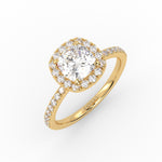 A cushion solitaire diamond ring with Pavé band and Halo design that highlight the beauty of the center stone. 