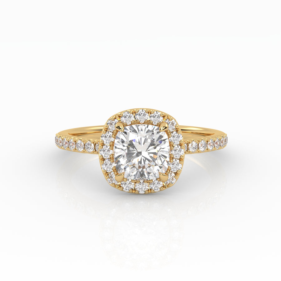 A captivating cushion-shaped diamond engagement ring with a luxurious Halo and Pavé band design.