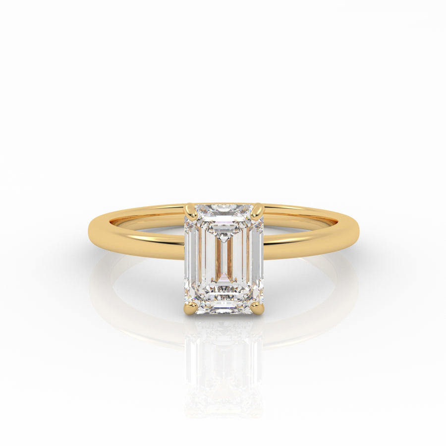 Emerald Solitaire engagement ring, made of 1-carat lab-grown diamond and 18k yellow gold. 