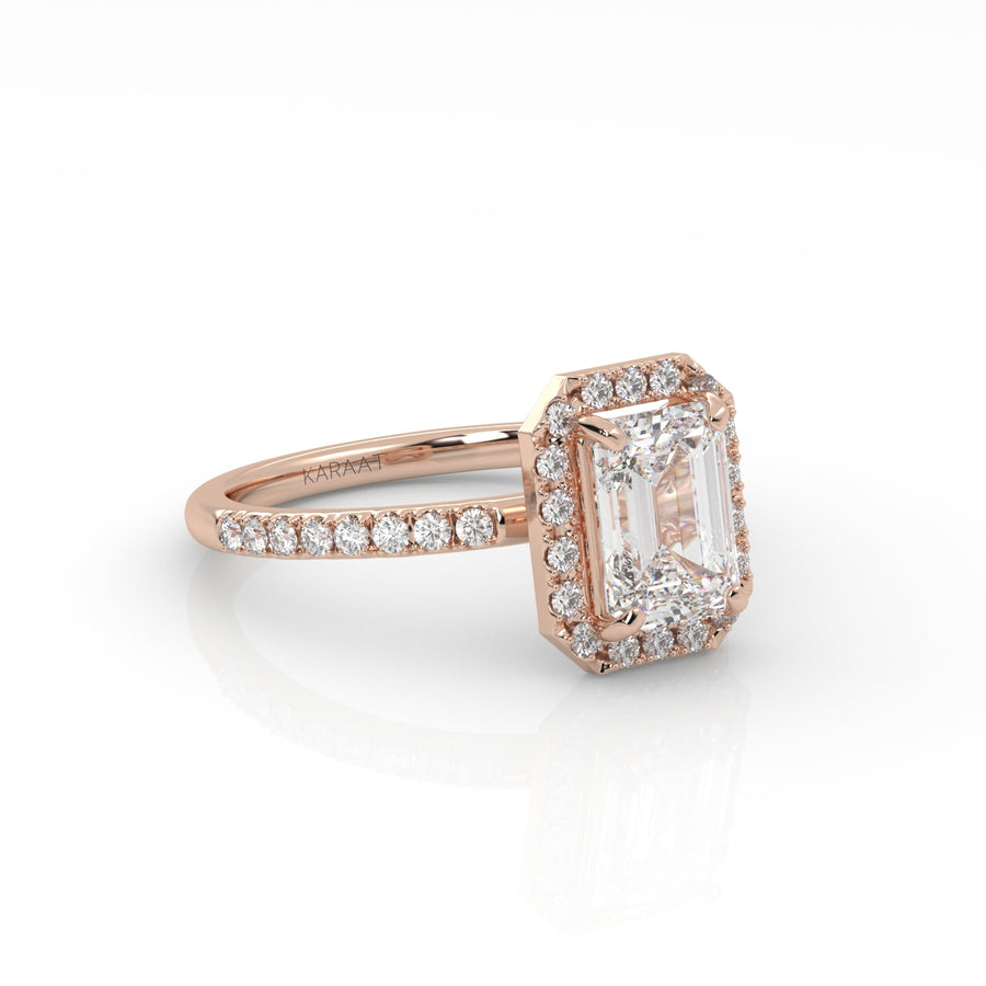 The Emerald Solitaire with Pavé band and Halo